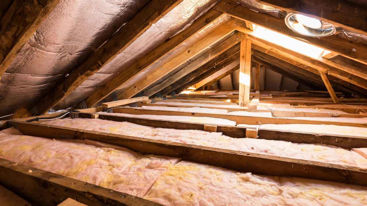 Ceiling insulation batts installed between roof timbers in an Australian home roof space