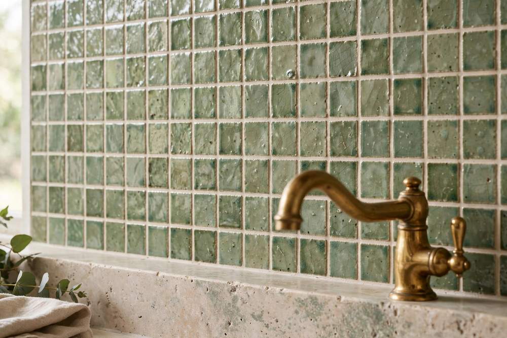 Kitchen splashback with handmade sage green zellige tiles