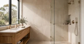 Modern Australian bathroom with large-format porcelain tiles and timber vanity