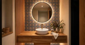 Elegant small powder room with floating vanity, vessel basin and brushed brass tapware