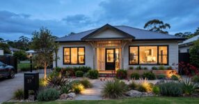 Renovated Australian home exterior at dusk with landscaped garden
