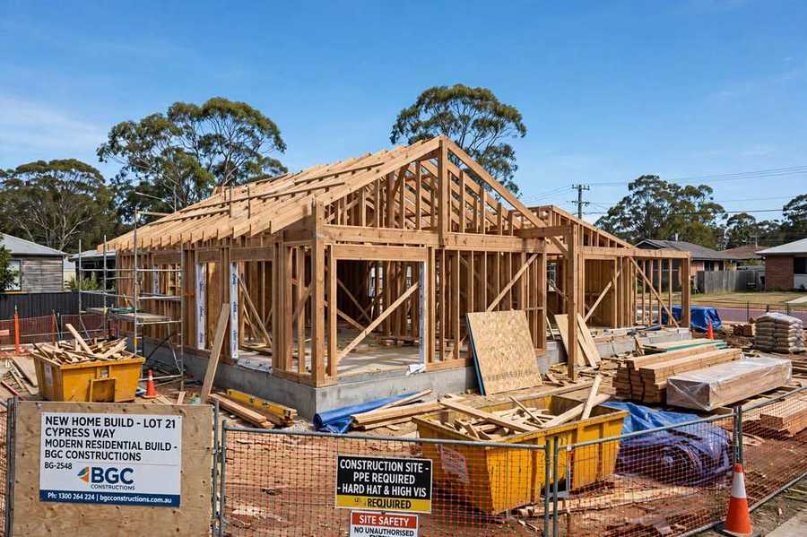 New modern Australian home under construction at timber frame stage