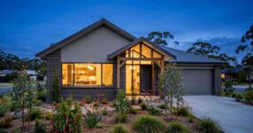 Newly framed Australian home under construction with timber framing and scaffolding